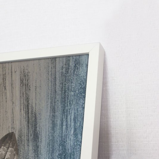 Detalhes da moldura e gravura.