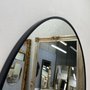 Espelho Decorativo Redondo com Moldura Preta: Elegância e Versatilidade para sua Decoração