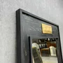 Espelho Decorativo Rústico com Moldura na Cor Preta e Aplique na Cor Dourada